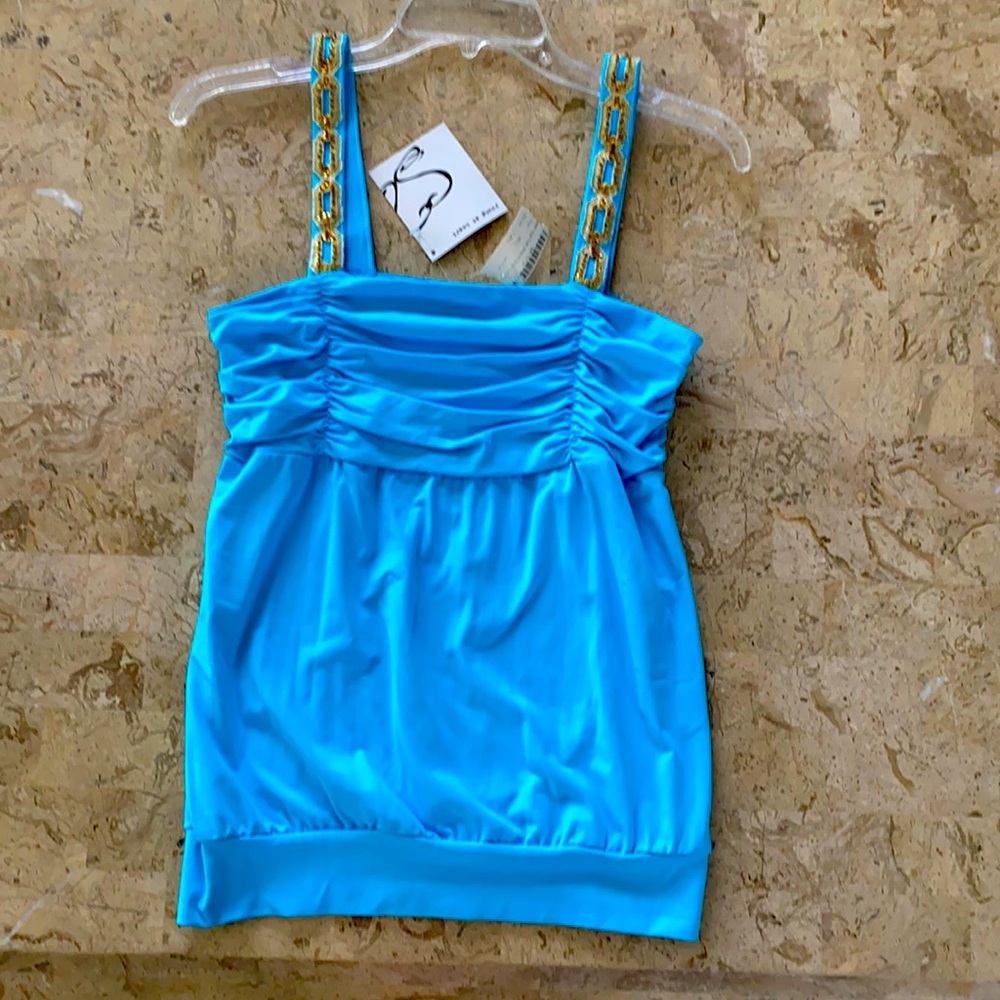 Young at heart Brand new with tags. Size Medium.